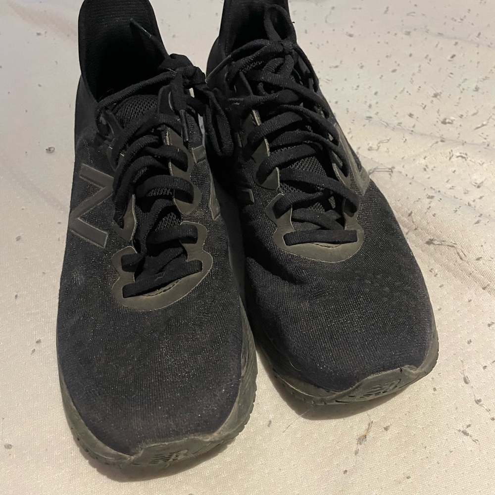 New Balance woman’s Black Sneakers size 9